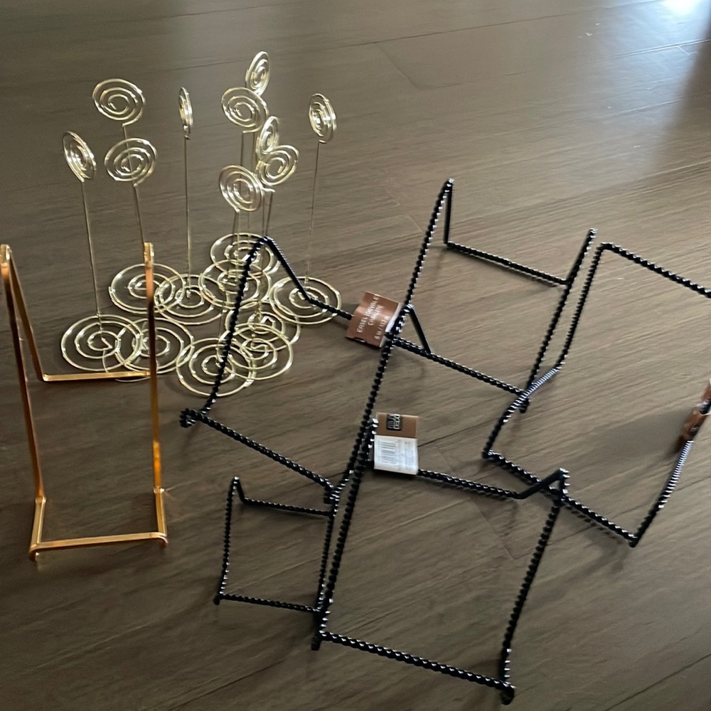 Ten gold wire table numbers and 6 photo/sign stands